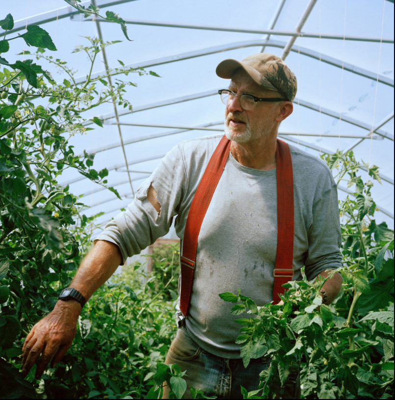 man in greenhouse